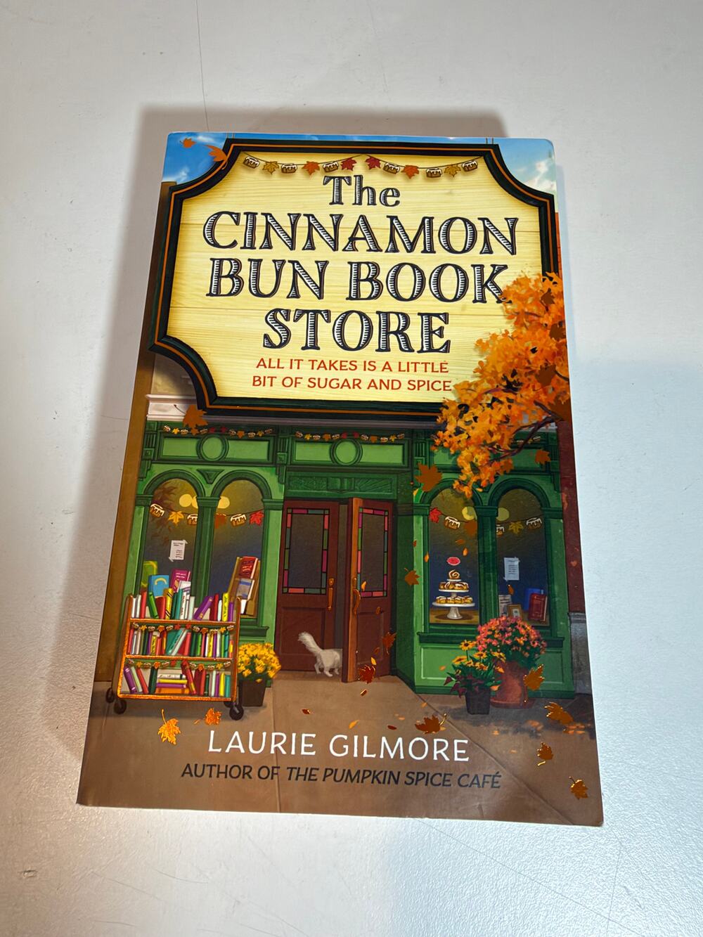 the Cinnamon Bun Book Store by Laurie Gilmore Paperback Book